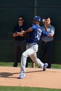 Friedman watches newly acquired Yaisel Sierra in a bullpen session during Spring Traniing. 